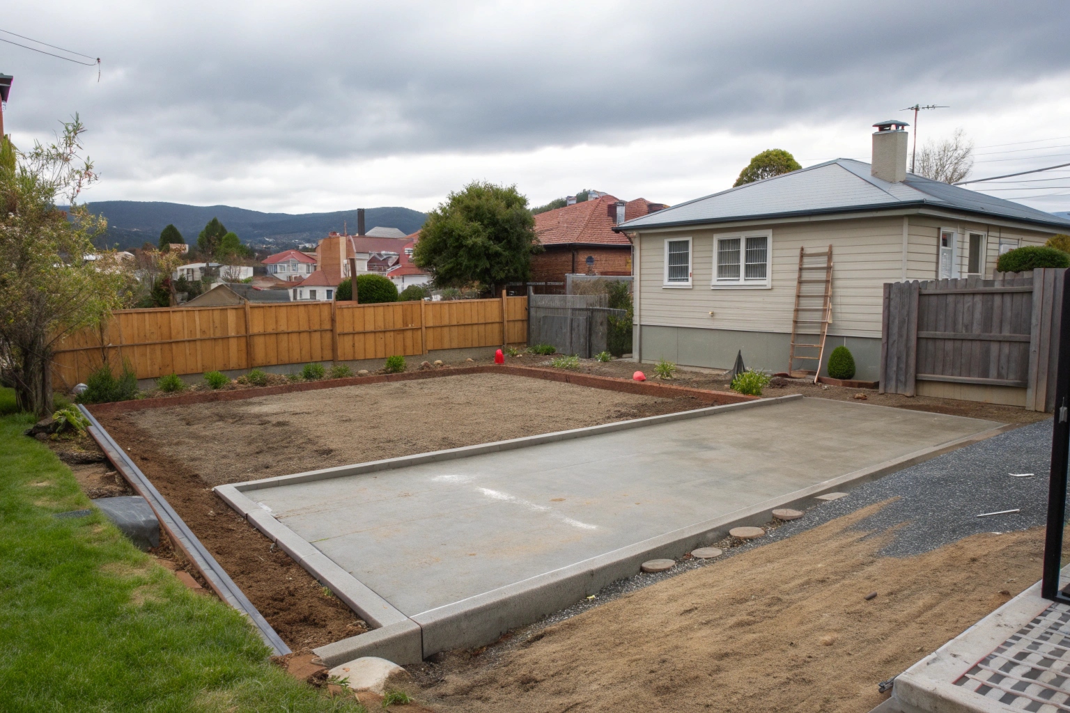 Site preparation with drainage installation for residential concrete in Hobart